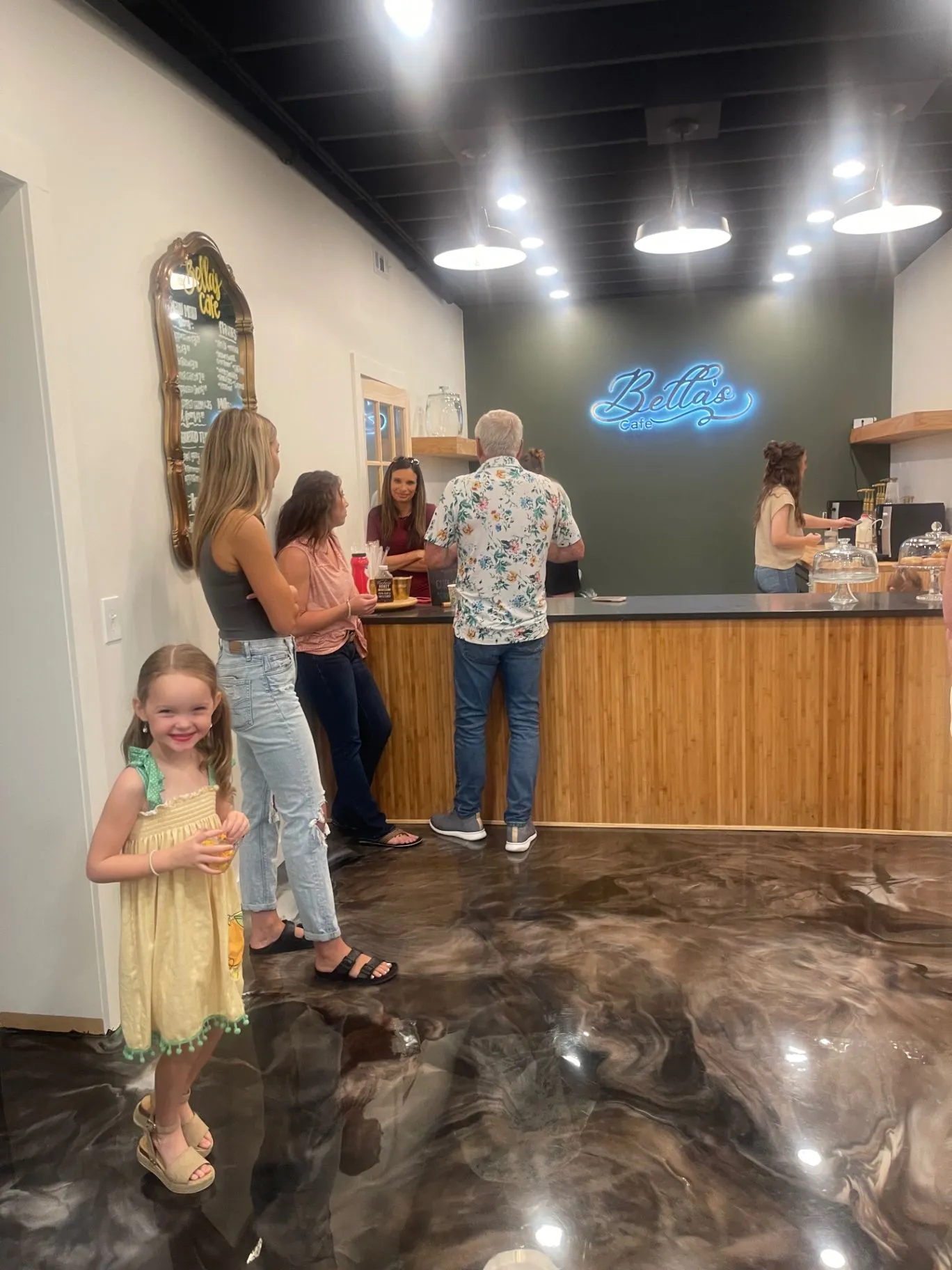Families and friends visiting the Bella’s Café counter at Cornerstone Church